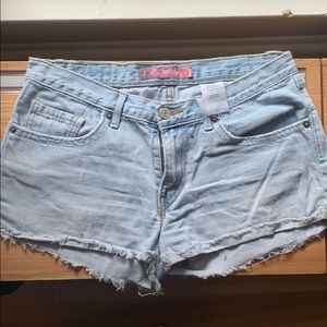 Women’s Levi jean shorts. Extremely distressed